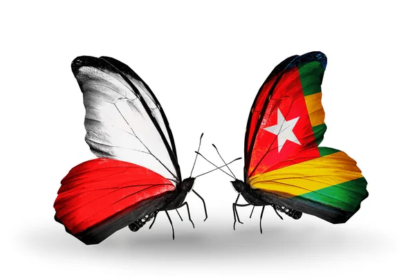 Dos mariposas con banderas de Polonia y Togo — Foto de Stock