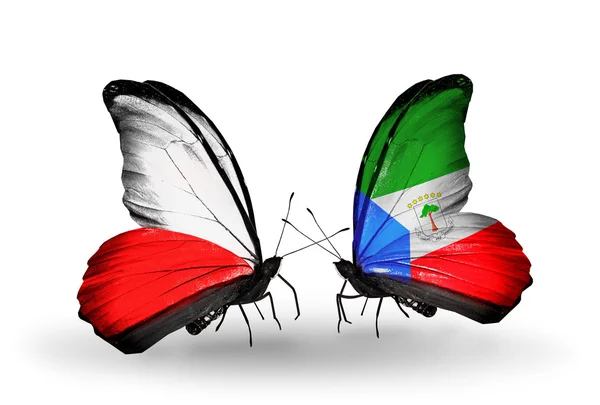 ポーランド、赤道ギニアの国旗と 2 匹の蝶 — ストック写真