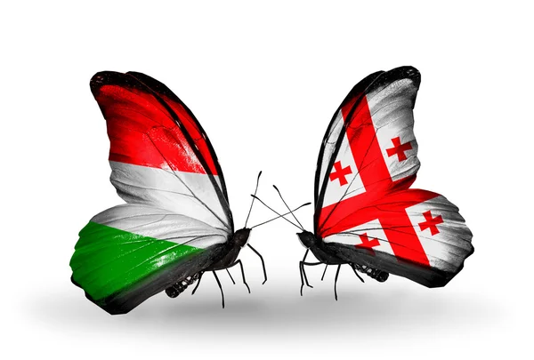 Dwa motyle z flagami, Węgry i Gruzji — Zdjęcie stockowe