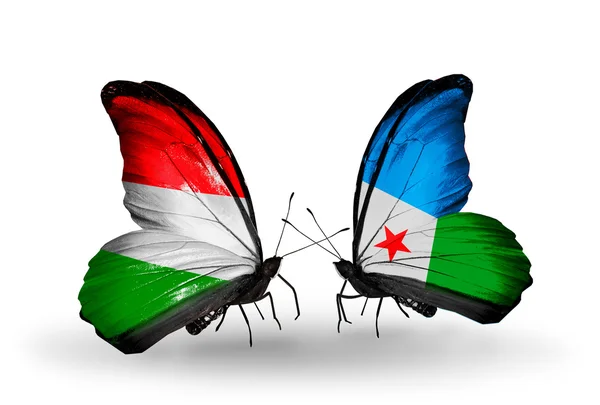 Deux papillons avec des drapeaux Hongrie et Djibouti — Photo