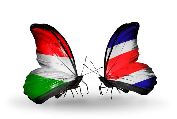 Duas borboletas com bandeiras Hungria e Costa Rica — Fotografia de Stock
