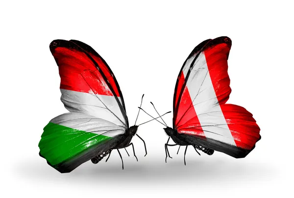 Two butterflies with flags Hungary and Peru — Stock Photo, Image