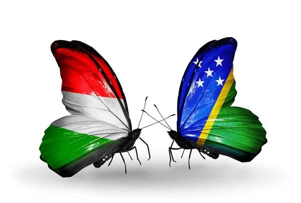 Motýli s vlajkami, Maďarsko a Šalamounovy ostrovy — Stock fotografie