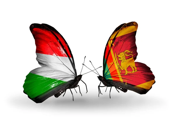 Macaristan ve sri lanka bayraklarıyla kelebekler — Stok fotoğraf