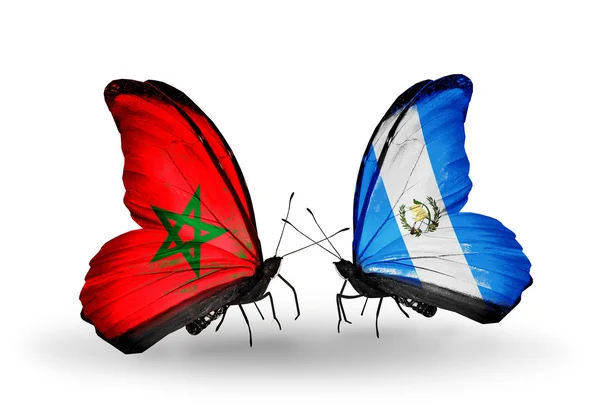 Mariposas con banderas Marruecos y Guatemala —  Fotos de Stock