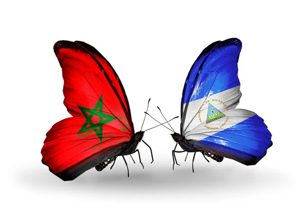 Mariposas con banderas de Marruecos y Nicaragua —  Fotos de Stock