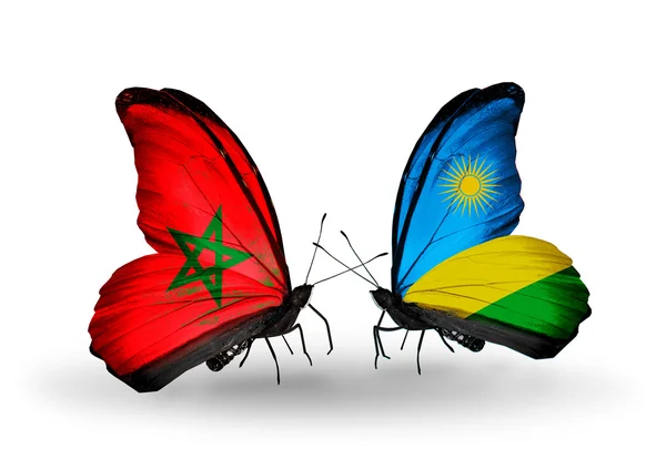 Papillons avec drapeaux du Maroc et du Rwanda — Photo