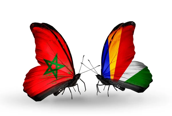 Duas borboletas com bandeiras Marrocos e Seychelles — Fotografia de Stock