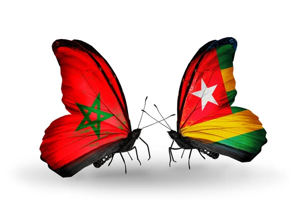 Deux papillons avec des drapeaux Maroc et Togo — Photo