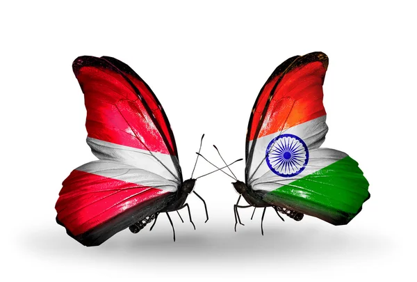 Two butterflies with flags of   Latvia and India — Stock Photo, Image