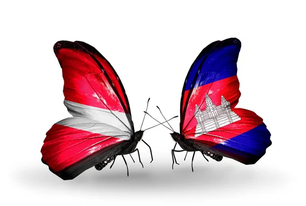 Dos mariposas con banderas de Letonia y Camboya — Foto de Stock