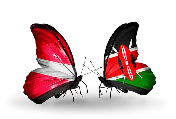 Two butterflies with flags of Latvia and  Kenya — Stock Photo, Image