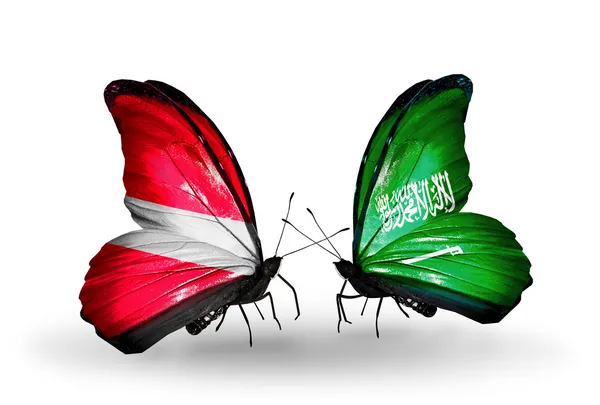 Mariposas con banderas de Letonia y Arabia Saudita — Foto de Stock