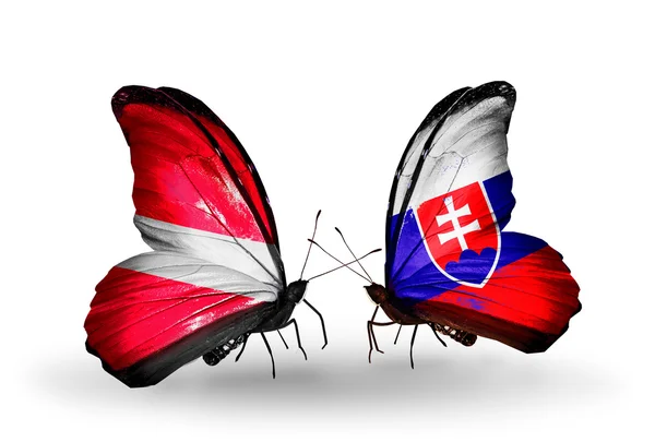 Butterflies with flags of Latvia and Slovakia — Stock Photo, Image