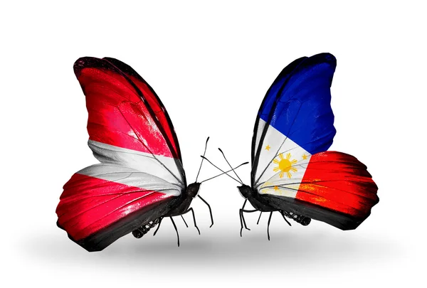 Butterflies with flags of Latvia and Philippines — Stock Photo, Image