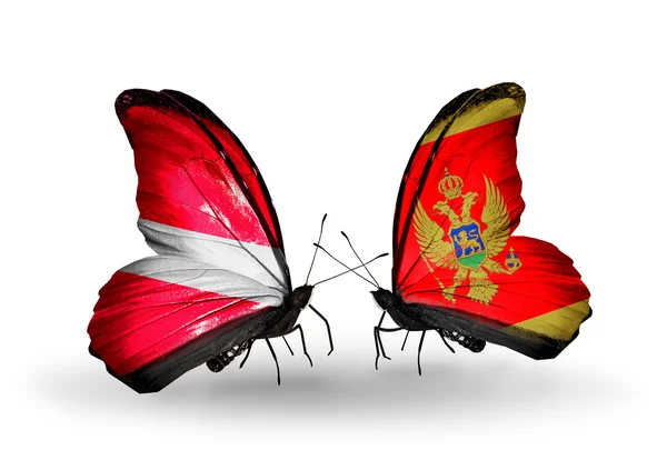 Mariposas con banderas de Letonia y Montenegro — Foto de Stock