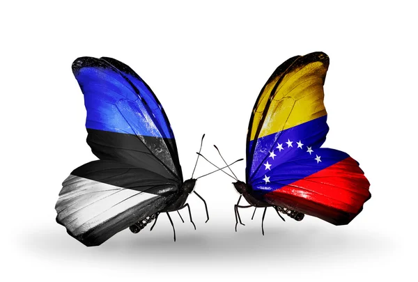 Motýli s vlajkami Estonska a venezuela — Stock fotografie