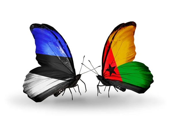 Mariposas con banderas de Estonia y Guinea Bissau —  Fotos de Stock