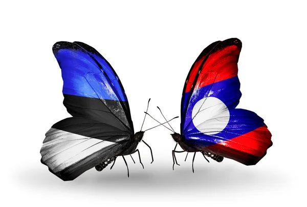 Motýli s vlajkami Estonska a Laosu — Stock fotografie
