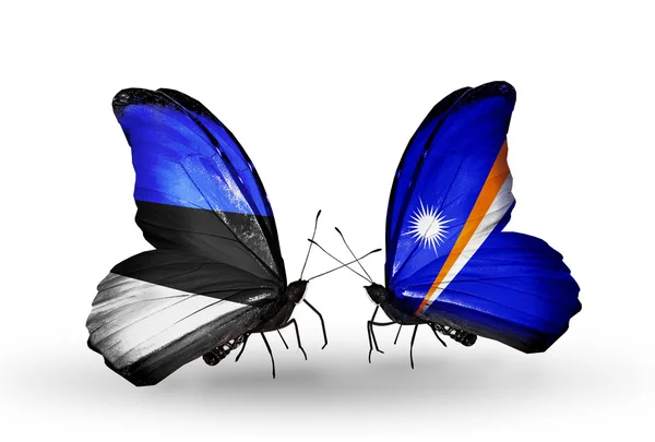 Twee vlinders met vlaggen van Estland en marshall eilanden — Stockfoto