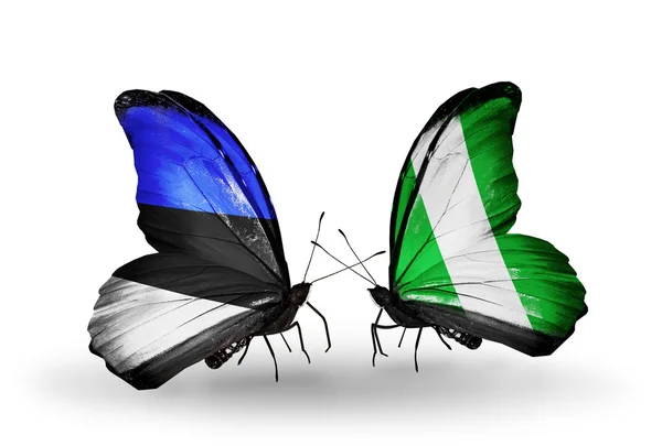Dwa motyle z flagami Estonii i Nigerii — Zdjęcie stockowe