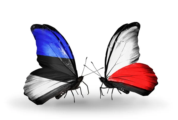 Two butterflies with flags of  Estonia and Poland — Stock Photo, Image