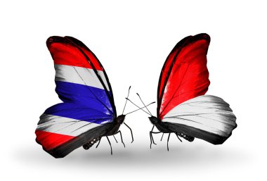 Monako, Endonezya ve Tayland bayrakları ile iki kelebek