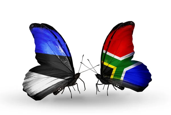 Farfalle con bandiere di Estonia e Sudafrica — Foto Stock