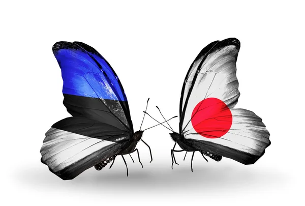 Estonya ve Japonya bayrakları taşıyan kelebekler — Stok fotoğraf
