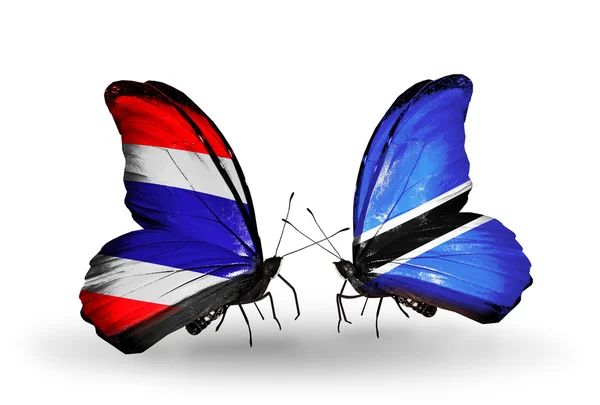 Butterflies with flags of Thailand and Botswana — Stock Photo, Image