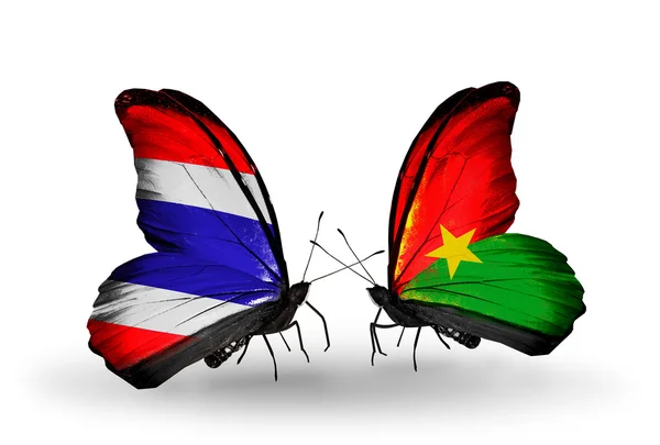 Due farfalle con bandiere di Thailandia e Burkina Faso — Foto Stock