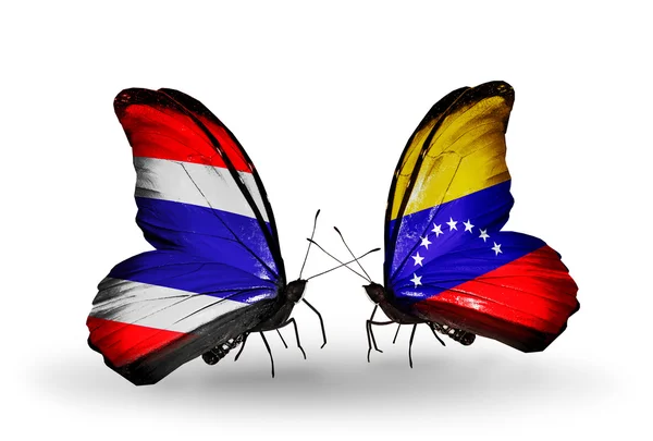 Twee vlinders met lijst van vlaggen van thailand en venezuela — Stockfoto