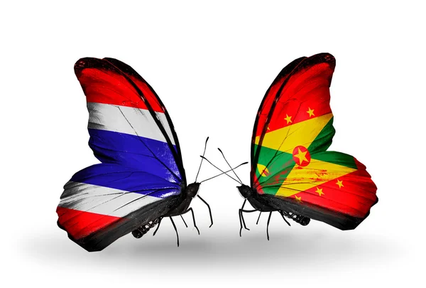 两只蝴蝶与泰国和格林纳达国旗 — 图库照片
