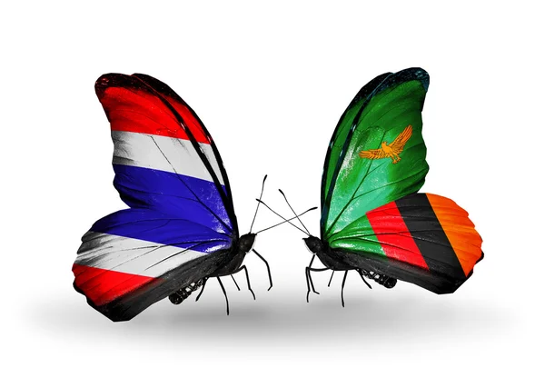Dos mariposas con banderas de Tailandia y Zambia — Foto de Stock
