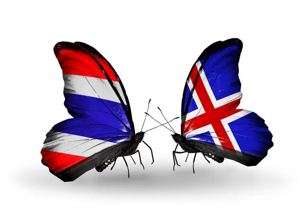 Deux papillons avec des drapeaux de Thaïlande et d'Islande — Photo
