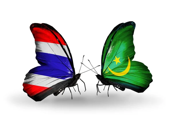 Deux papillons avec des drapeaux de Thaïlande et de Mauritanie — Photo