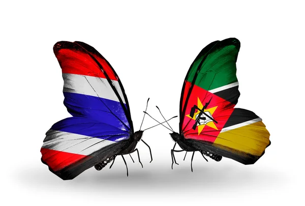 Butterflies with flags on wings of Thailand and Mozambique — Stock Photo, Image