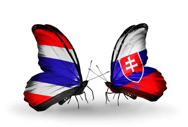 Butterflies with flags on wings of Thailand and Slovakia — Stock Photo, Image