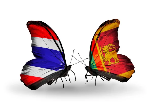 Butterflies with Thailand and Sri Lanka flags on wings — Stock Photo, Image