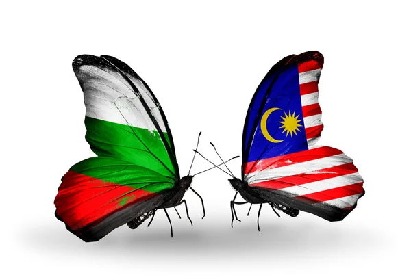 Borboletas com bandeiras da Bulgária e da Malásia em asas — Fotografia de Stock
