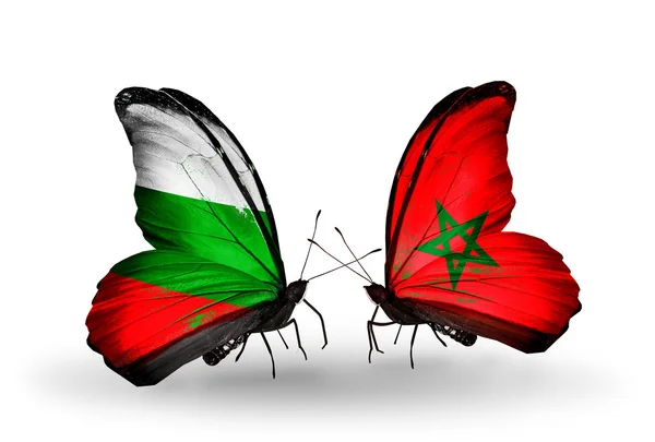Borboletas com bandeiras da Bulgária e Marrocos em asas — Fotografia de Stock
