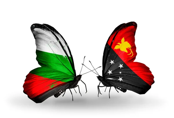 Kelebek kanatları üzerinde Bulgaristan ve papua Yeni Gine bayraklı — Stok fotoğraf