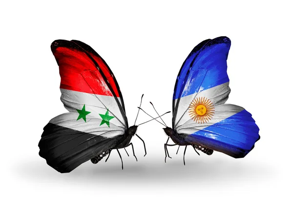 Butterflies with Syria and Argentina flags on wings — Stock Photo, Image
