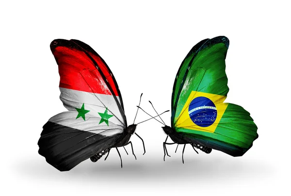Papillons avec drapeaux Syrie et Brésil sur les ailes — Photo