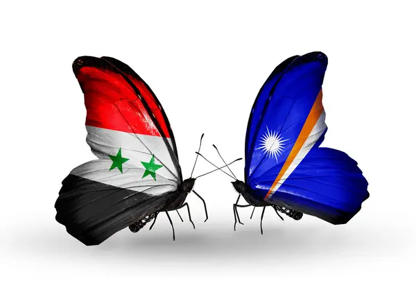 Butterflies with Syria and Marshall islands flags on wings — Stock Photo, Image