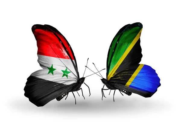 Butterflies with Syria and Tanzania flags on wings — Stock Photo, Image