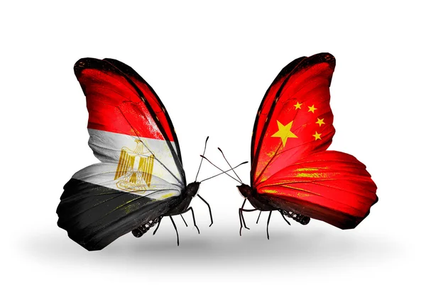 Butterflies with Egypt and China flags on wings — Stock Photo, Image