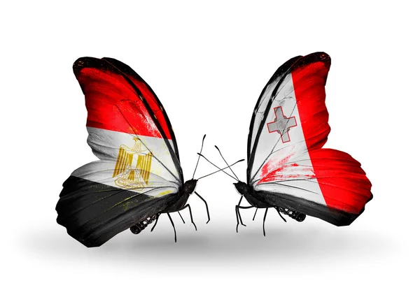 Butterflies with Egypt and Malta flags on wings — Stock Photo, Image