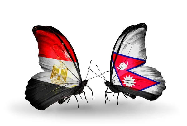 Mariposas con banderas de Egipto y Nepal en alas — Foto de Stock