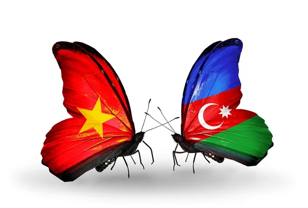Borboletas com bandeiras do Vietnã e Azerbaijão em asas — Fotografia de Stock